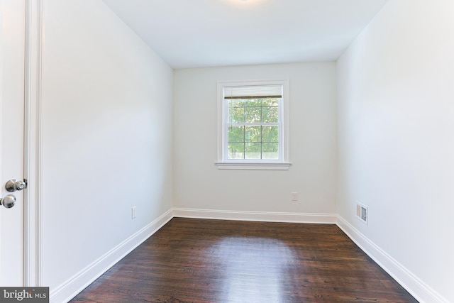 228 Warren Blvd, Broomall, PA 19008 - spare room featuring dark wood-type flooring and baseboards