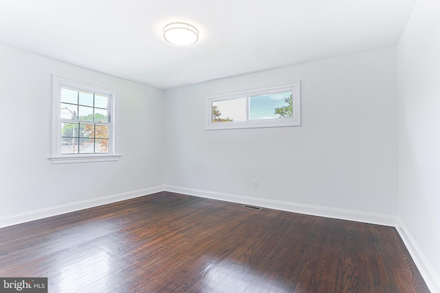 228 Warren Blvd, Broomall, PA 19008 - unfurnished room with plenty of natural light and dark wood-type flooring