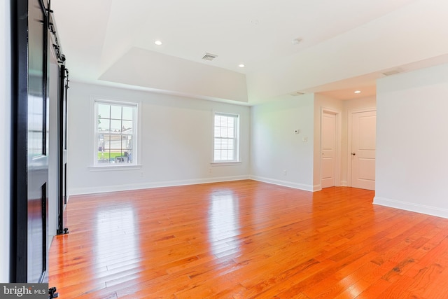 228 Warren Blvd, Broomall, PA 19008 - spare room with light wood-style floors, a tray ceiling, recessed lighting, and a smoke detector