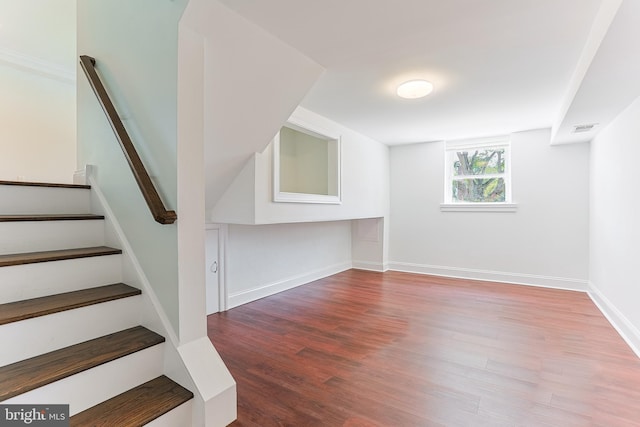 228 Warren Blvd, Broomall, PA 19008 - basement with wood finished floors and stairway