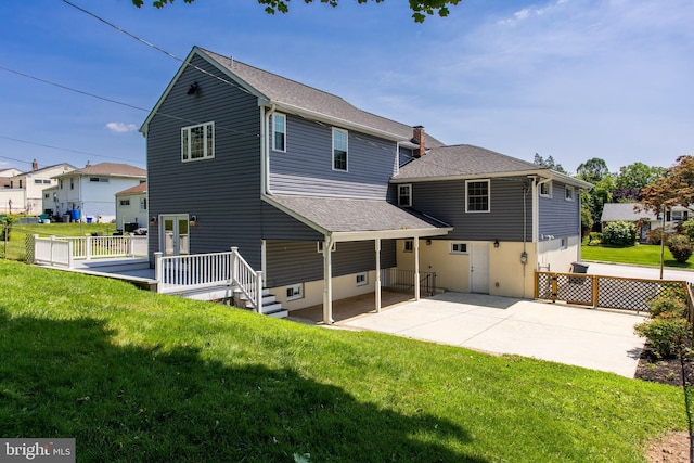 228 Warren Blvd, Broomall, PA 19008 - back of house with a patio, a deck, and a shingled roof
