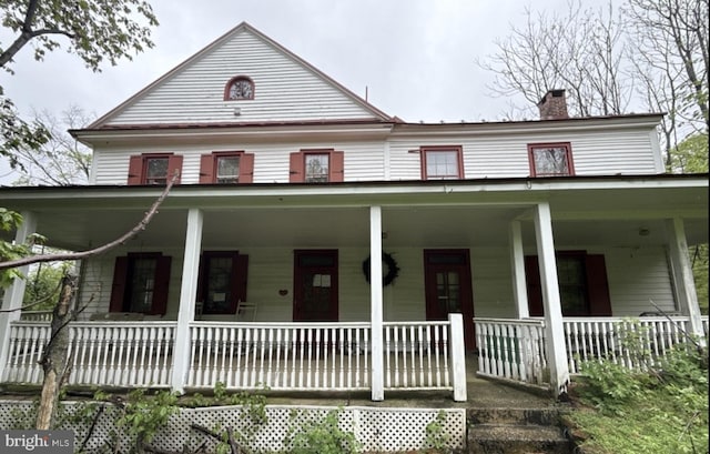 10 Kricks Mill Rd, Womelsdorf, PA 19567 - farmhouse inspired home with covered porch and a chimney