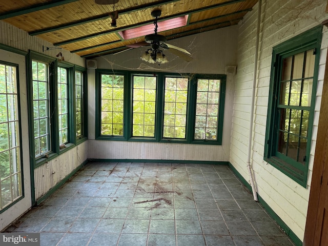 10 Kricks Mill Rd, Womelsdorf, PA 19567 - unfurnished sunroom with stone finish floors, healthy amount of natural light, and vaulted ceiling