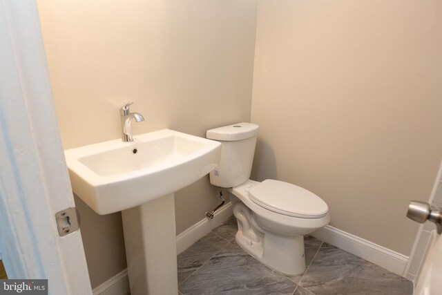 136 Chadwick Ave, Linwood, PA 19061 - bathroom featuring toilet and marble finish floors