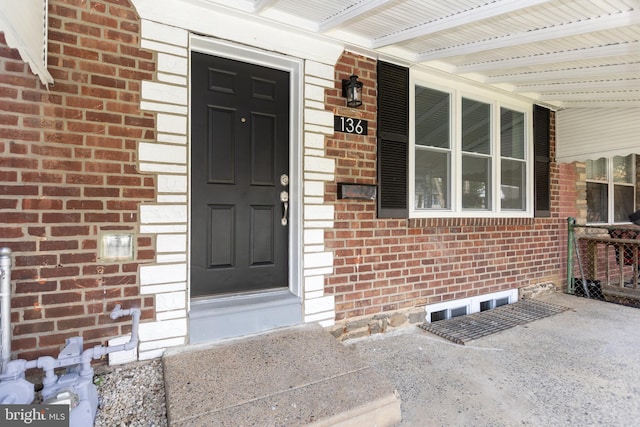 136 Chadwick Ave, Linwood, PA 19061 - property entrance with covered porch and brick siding