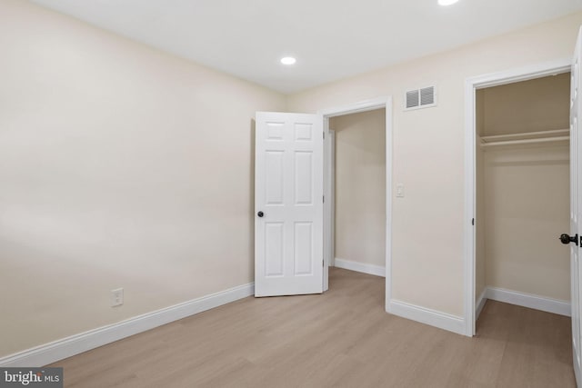 19 Glen Stewart Dr, Ewing, NJ 08618 - unfurnished bedroom featuring light wood-style floors, a closet, and recessed lighting