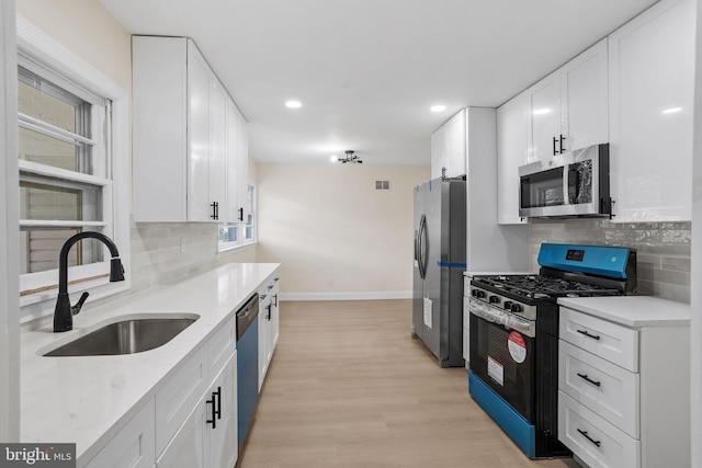 19 Glen Stewart Dr, Ewing, NJ 08618 - kitchen featuring stainless steel appliances, backsplash, recessed lighting, and white cabinetry