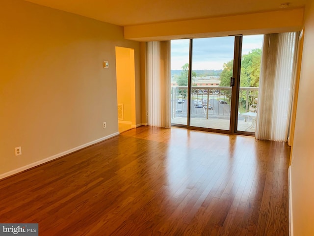 5800 Nicholson Ln Unit 1-908, Rockville, MD 20852 - empty room featuring dark wood finished floors and baseboards