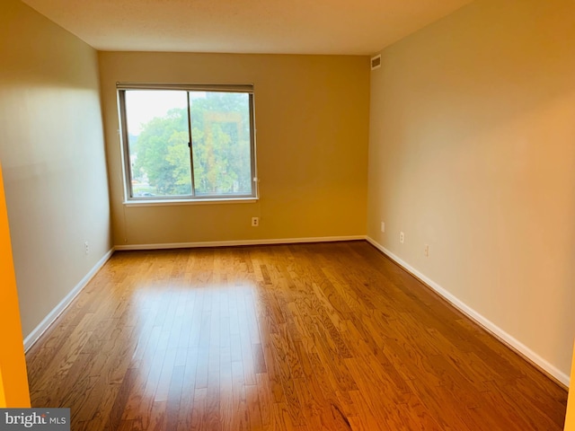 5800 Nicholson Ln Unit 1-908, Rockville, MD 20852 - unfurnished room with wood finished floors and baseboards