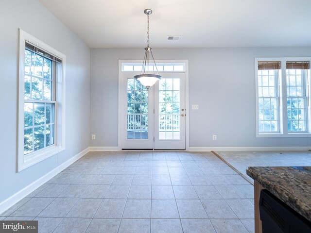 591 Odendhal Ave Unit 591, Gaithersburg, MD 20877 - doorway to outside with baseboards and light tile patterned flooring