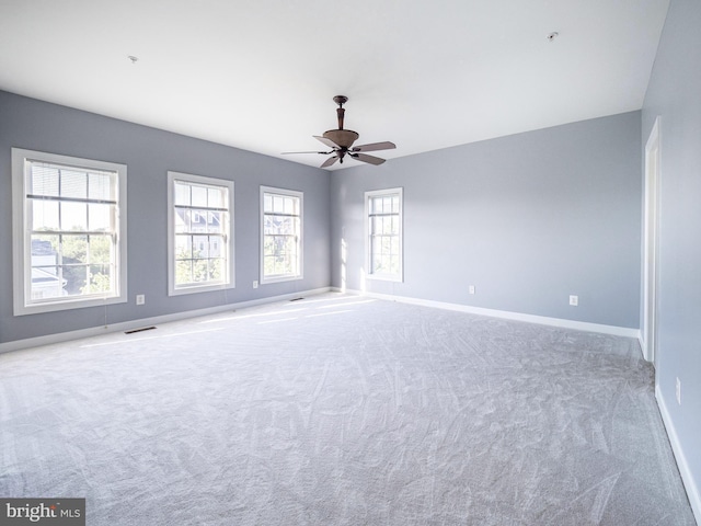 591 Odendhal Ave Unit 591, Gaithersburg, MD 20877 - empty room featuring healthy amount of natural light, carpet, and ceiling fan