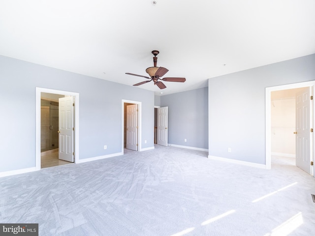 591 Odendhal Ave Unit 591, Gaithersburg, MD 20877 - unfurnished bedroom with a walk in closet, light colored carpet, a closet, and ensuite bathroom