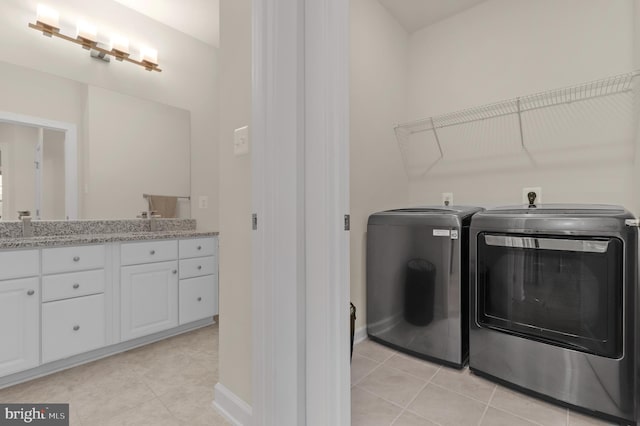 1025 Mutual Pl, Sandy Spring, MD 20860 - washroom featuring independent washer and dryer and light tile patterned flooring