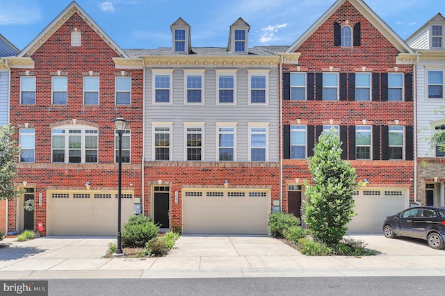 1025 Mutual Pl, Sandy Spring, MD 20860 - multi unit property with an attached garage, brick siding, and driveway