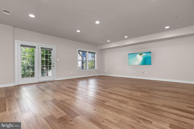 1025 Mutual Pl, Sandy Spring, MD 20860 - spare room with light wood-style floors, recessed lighting, and plenty of natural light