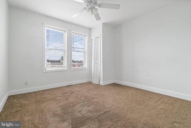 1816 Chilton St, Baltimore, MD 21218 - carpeted empty room with baseboards and ceiling fan