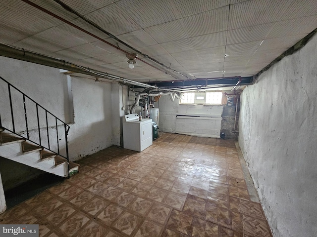 3902 Howland St, Philadelphia, PA 19124 - basement with washer / clothes dryer, tile patterned floors, stairs, and water heater