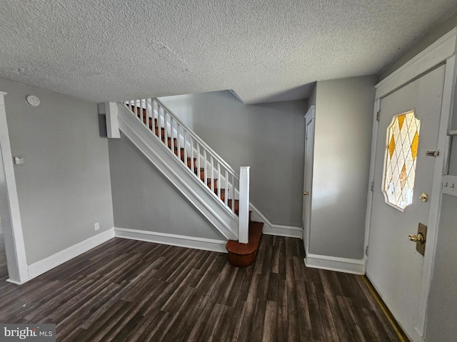 3902 Howland St, Philadelphia, PA 19124 - entryway with wood finished floors, a textured ceiling, and stairway