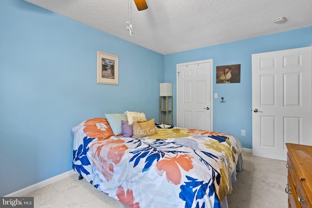 8 Cheverny Ct, Hamilton, NJ 08619 - carpeted bedroom featuring a textured ceiling and ceiling fan