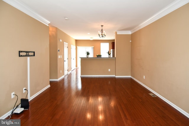 42825 Pamplin Ter, Chantilly, VA 20152 - unfurnished living room featuring a chandelier, dark wood-type flooring, and crown molding