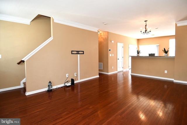 42825 Pamplin Ter, Chantilly, VA 20152 - unfurnished living room with ornamental molding, a chandelier, hardwood / wood-style flooring, and stairs