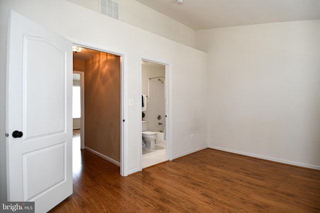 42825 Pamplin Ter, Chantilly, VA 20152 - unfurnished bedroom with wood finished floors and connected bathroom