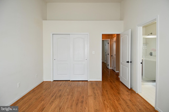 42825 Pamplin Ter, Chantilly, VA 20152 - unfurnished bedroom featuring wood finished floors, a closet, and ensuite bath