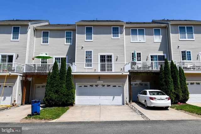 42825 Pamplin Ter, Chantilly, VA 20152 - back of house with a garage and concrete driveway