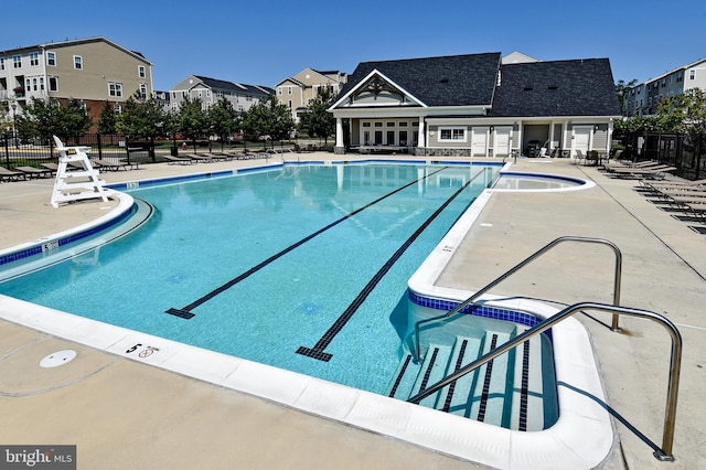 42825 Pamplin Ter, Chantilly, VA 20152 - community pool featuring a patio and a residential view