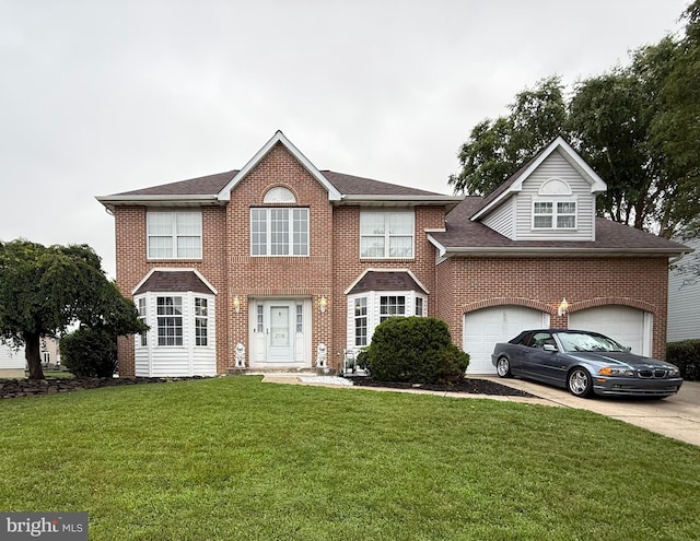 206 Mangum Dr, Bear, DE 19701 - view of front of property with a front yard, a garage, driveway, and brick siding