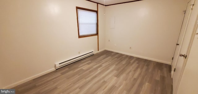 53 Snow Bird Trl, Fairfield, PA 17320 - unfurnished room with a baseboard radiator and light wood-style flooring