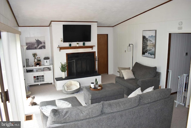 53 Snow Bird Trl, Fairfield, PA 17320 - carpeted living room with a fireplace with raised hearth, lofted ceiling, and ornamental molding