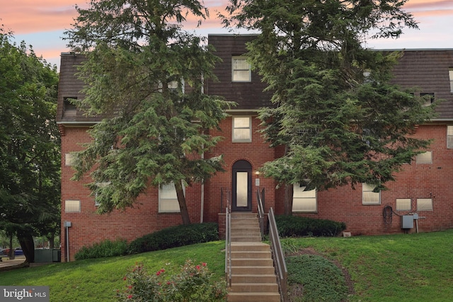 4000 Gypsy Ln Unit 529, Philadelphia, PA 19129 - view of front facade with a yard and brick siding