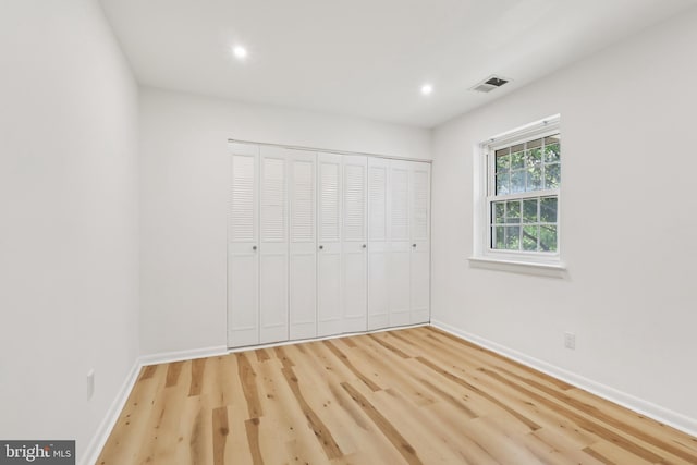 4000 Gypsy Ln Unit 529, Philadelphia, PA 19129 - unfurnished bedroom featuring wood finished floors, recessed lighting, and a closet