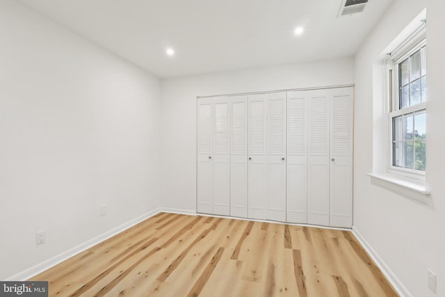 4000 Gypsy Ln Unit 529, Philadelphia, PA 19129 - unfurnished bedroom with wood finished floors, recessed lighting, and a closet