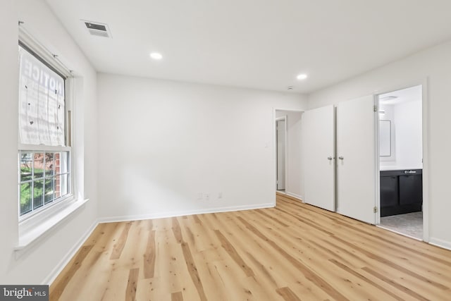 4000 Gypsy Ln Unit 529, Philadelphia, PA 19129 - unfurnished bedroom featuring light wood-style flooring, recessed lighting, and ensuite bathroom