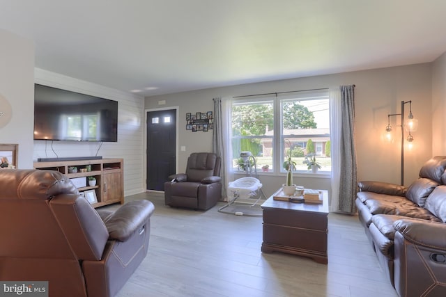 112 Lynmar Ave, Palmyra, PA 17078 - living area with wood walls and light wood-style flooring