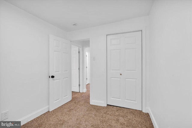 1579 S 8th St, Camden, NJ 08104 - unfurnished bedroom featuring light carpet and a closet