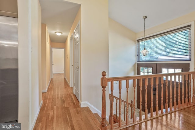 5606 Eastbourne Dr, Springfield, VA 22151 - hallway featuring an upstairs landing and wood finished floors