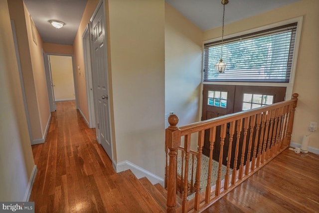 5606 Eastbourne Dr, Springfield, VA 22151 - hall featuring an upstairs landing and wood finished floors