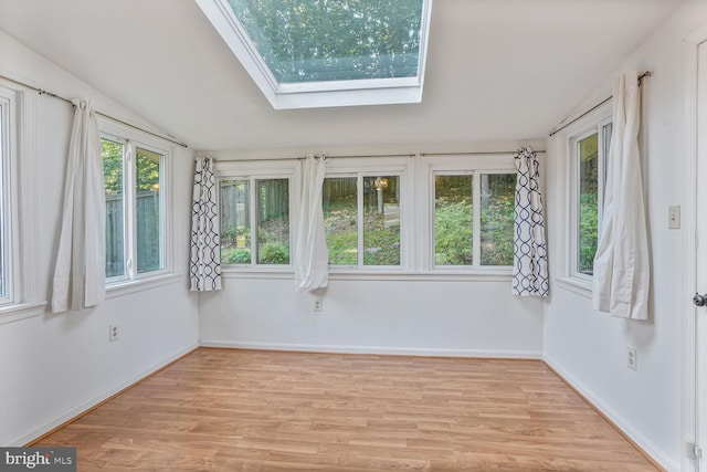 5606 Eastbourne Dr, Springfield, VA 22151 - unfurnished sunroom with a skylight, wood finished floors, and lofted ceiling
