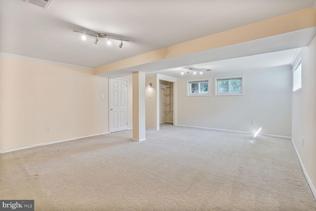 5606 Eastbourne Dr, Springfield, VA 22151 - basement featuring light carpet, track lighting, and ornamental molding