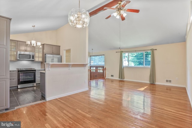 5606 Eastbourne Dr, Springfield, VA 22151 - kitchen with stainless steel appliances, a chandelier, gray cabinets, a ceiling fan, and tasteful backsplash