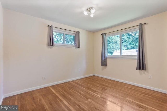 5606 Eastbourne Dr, Springfield, VA 22151 - unfurnished room with wood finished floors and plenty of natural light