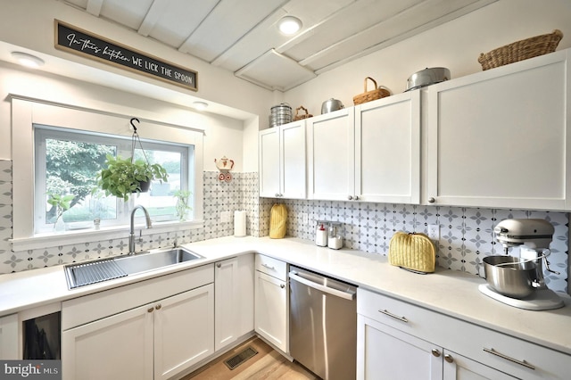 137 S E St, Spring Grove, PA 17362 - kitchen featuring dishwasher, tasteful backsplash, and light countertops