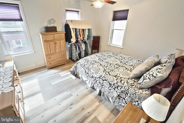 137 S E St, Spring Grove, PA 17362 - bedroom featuring light wood-style floors, a closet, a spacious closet, and ceiling fan