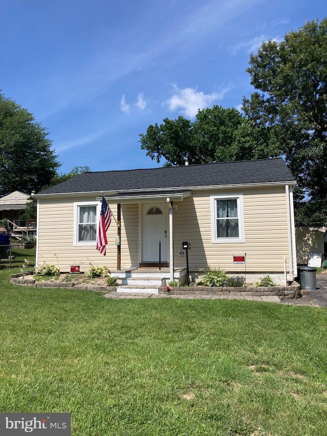 113 Alcock Rd, Essex, MD 21221 - single story home featuring a front lawn