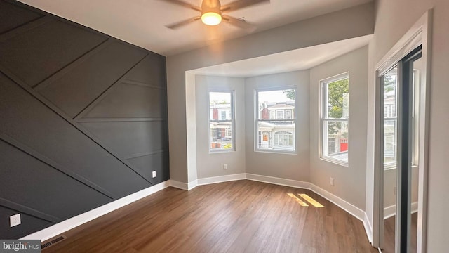 5841 Cedarhurst St, Philadelphia, PA 19143 - spare room featuring wood finished floors and ceiling fan