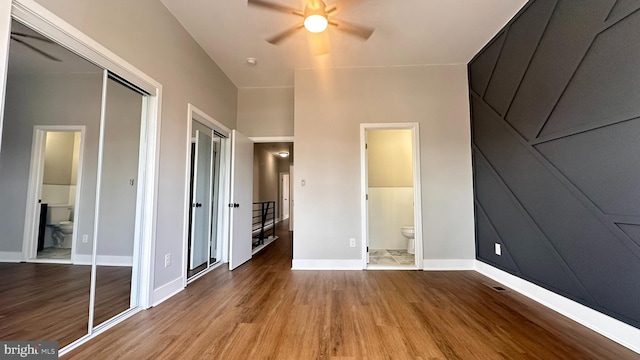 5841 Cedarhurst St, Philadelphia, PA 19143 - unfurnished bedroom with wood finished floors, ensuite bath, and a ceiling fan