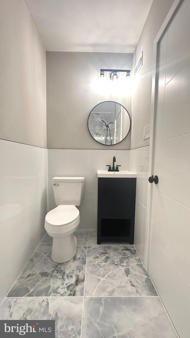 5841 Cedarhurst St, Philadelphia, PA 19143 - bathroom featuring vanity and marble look tile flooring